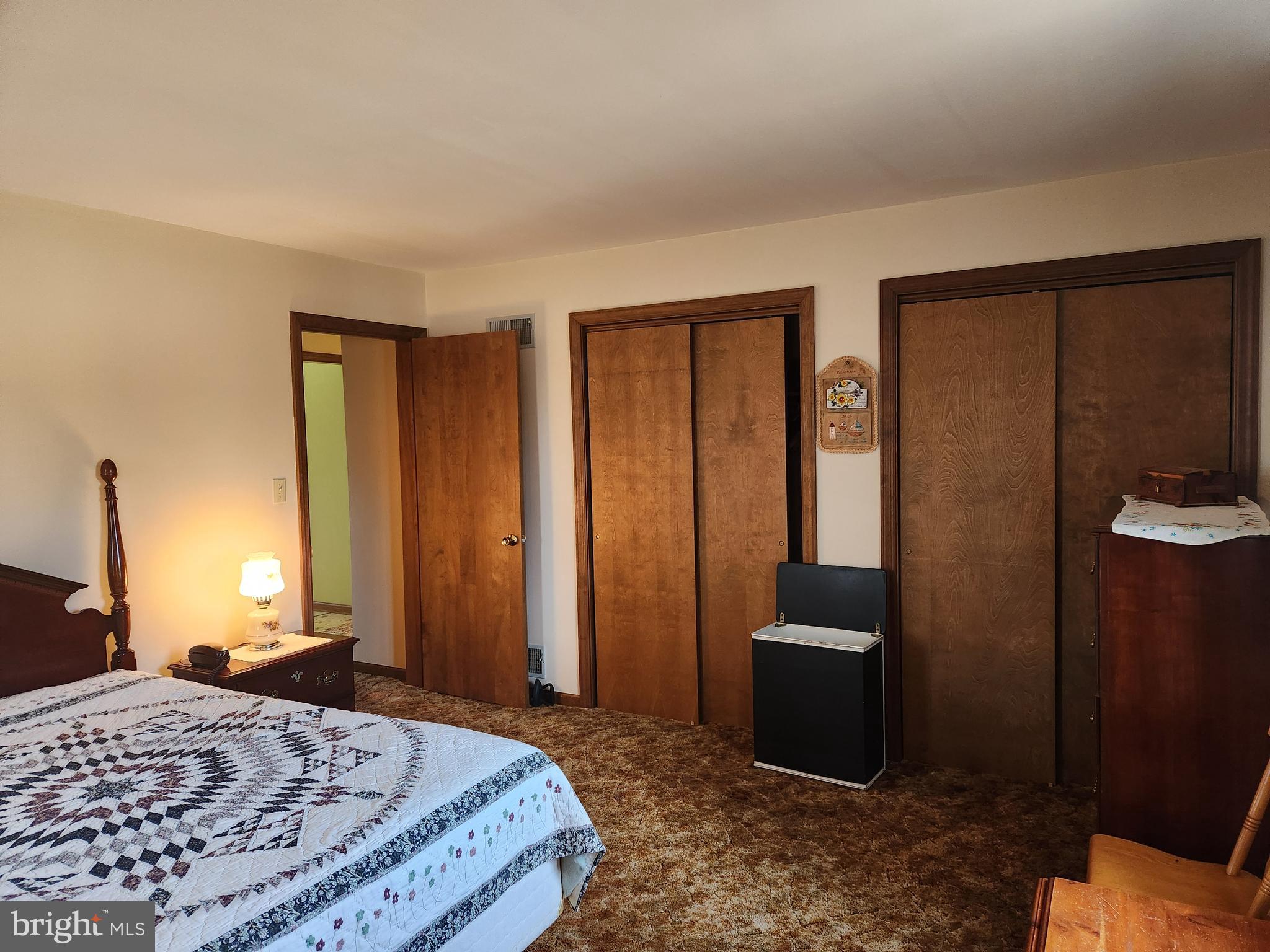 236 Pittsburg Valley Road Conestoga, PA 17516 - Photo 22 of 75 a bedroom with a bed and a dresser