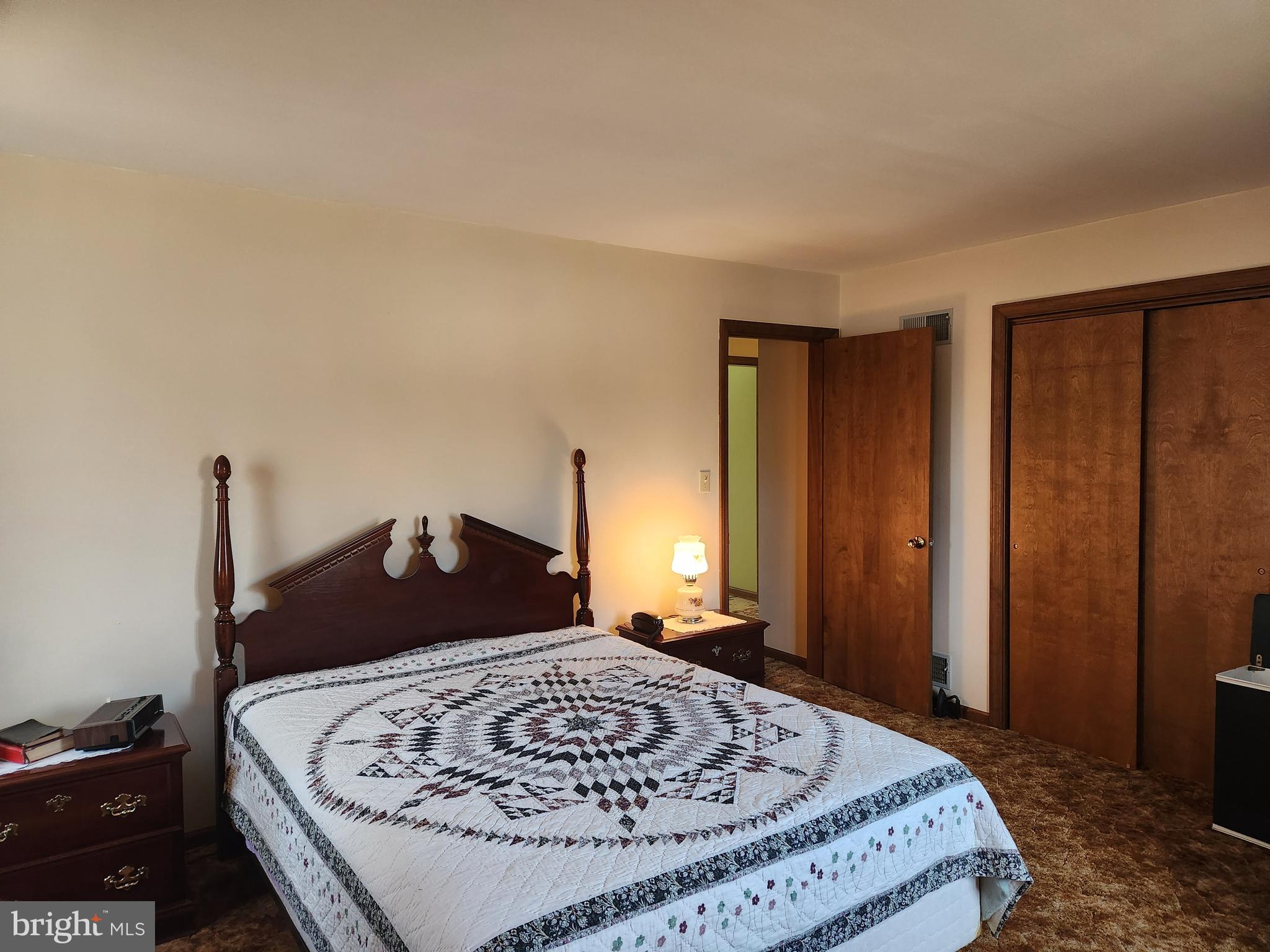 236 Pittsburg Valley Road Conestoga, PA 17516 - Photo 23 of 75 a bedroom with a bed and wooden floor