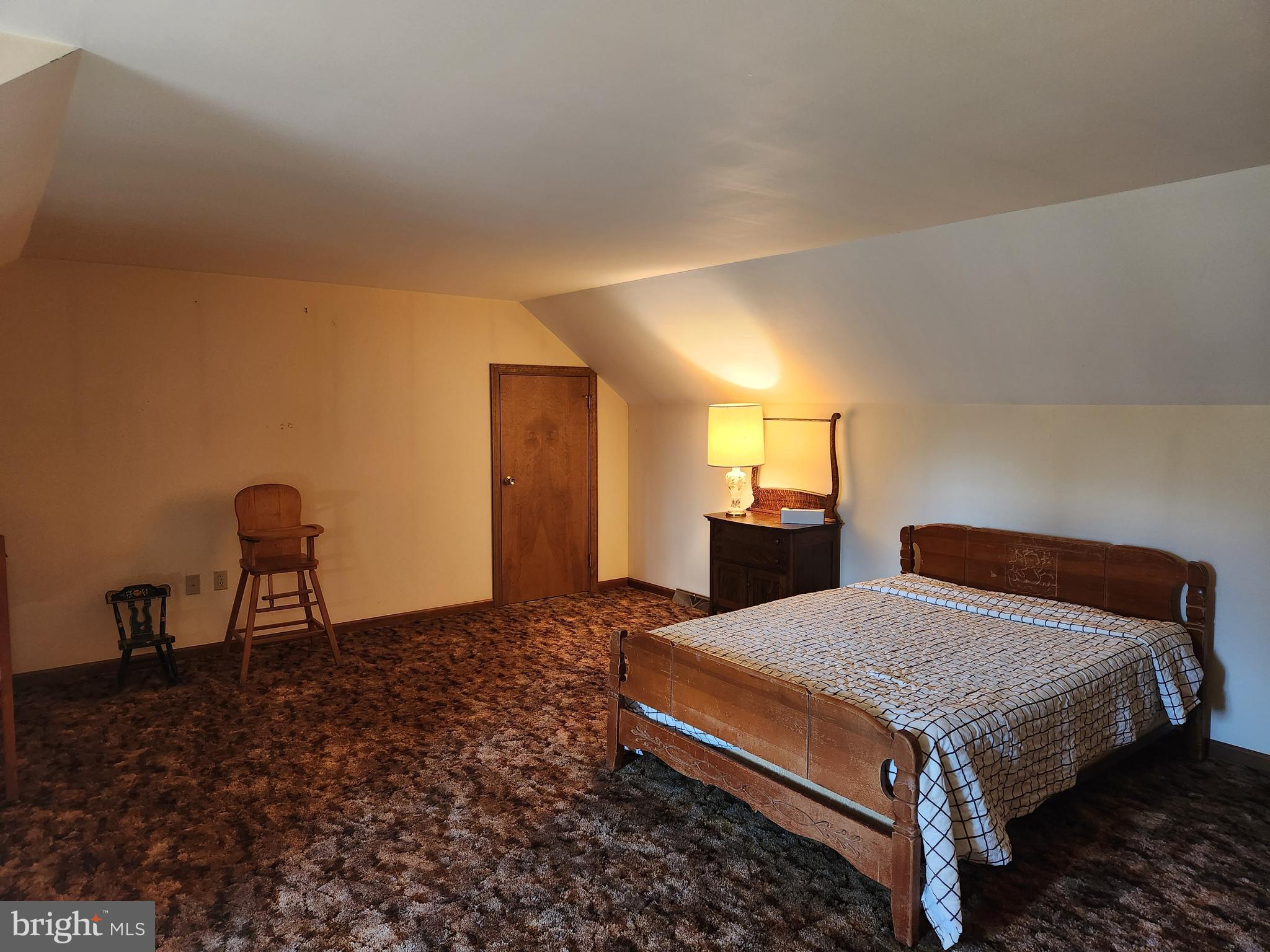 236 Pittsburg Valley Road Conestoga, PA 17516 - Photo 30 of 75 a bedroom with a bed and a table in it