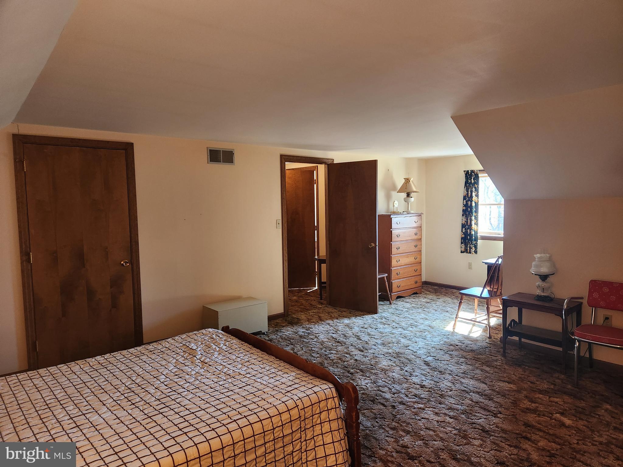 236 Pittsburg Valley Road Conestoga, PA 17516 - Photo 31 of 75 a bedroom with a bed and a table in it