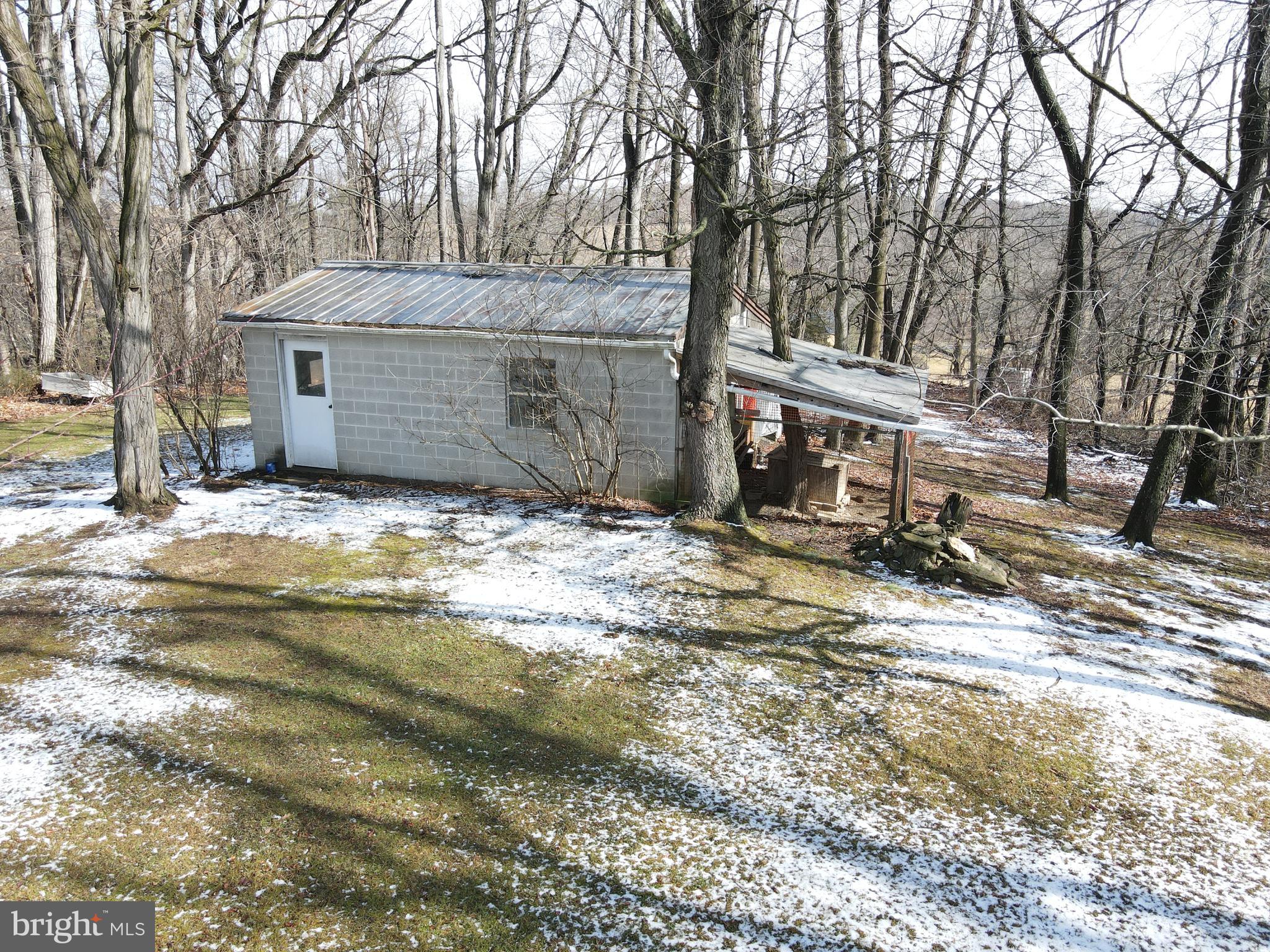 236 Pittsburg Valley Road Conestoga, PA 17516 - Photo 64 of 75 a view of a house with a yard covered in snow