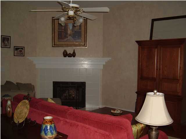 4445 Antioch Road Crestview, FL 32536 - Photo 3 of 10 a living room with furniture and a fireplace