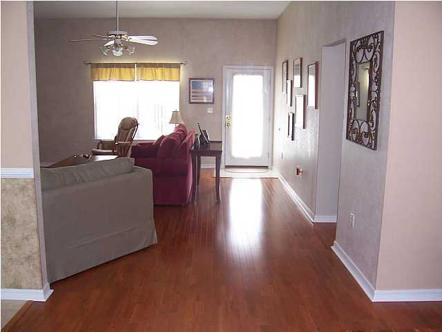 4445 Antioch Road Crestview, FL 32536 - Photo 4 of 10 a living room with furniture and a window
