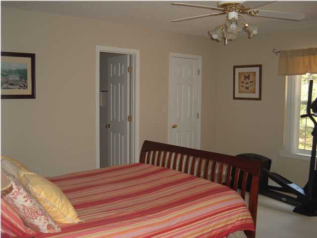 4445 Antioch Road Crestview, FL 32536 - Photo 7 of 10 a bedroom with a bed and window