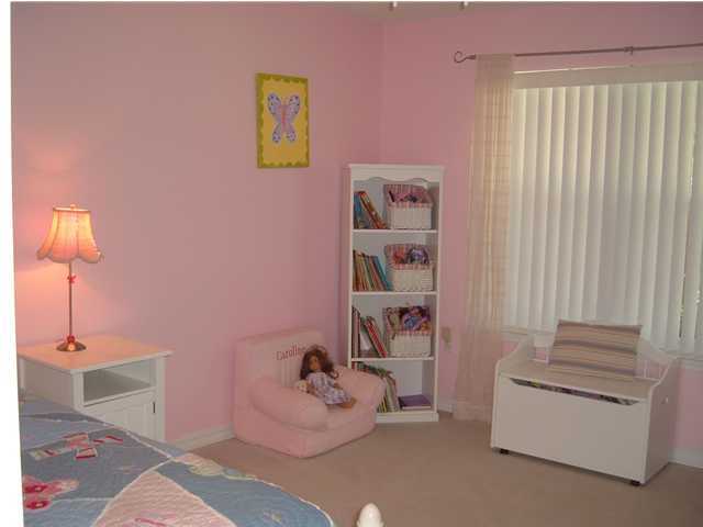 4445 Antioch Road Crestview, FL 32536 - Photo 8 of 10 a room with furniture and a window