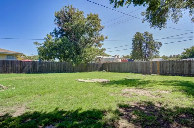 a view of a backyard with a garden