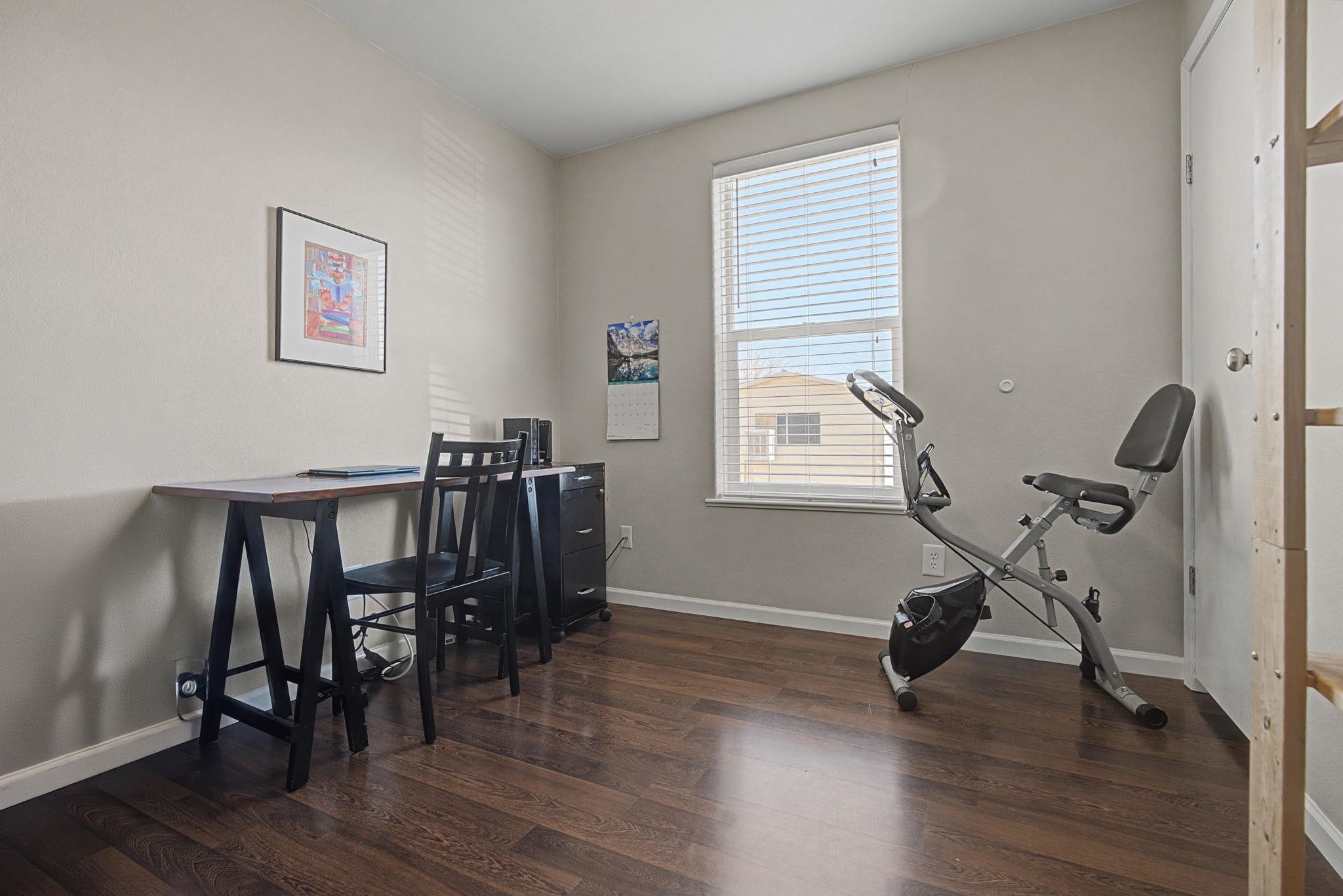 3251 E Road, Unit 72 Clifton, CO 81520 - Photo 17 of 25 a view of a workspace with furniture and a window