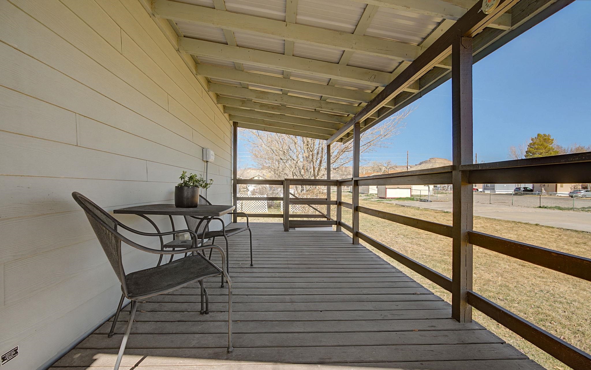 3251 E Road, Unit 72 Clifton, CO 81520 - Photo 23 of 25 a view of a outdoor space with seating area