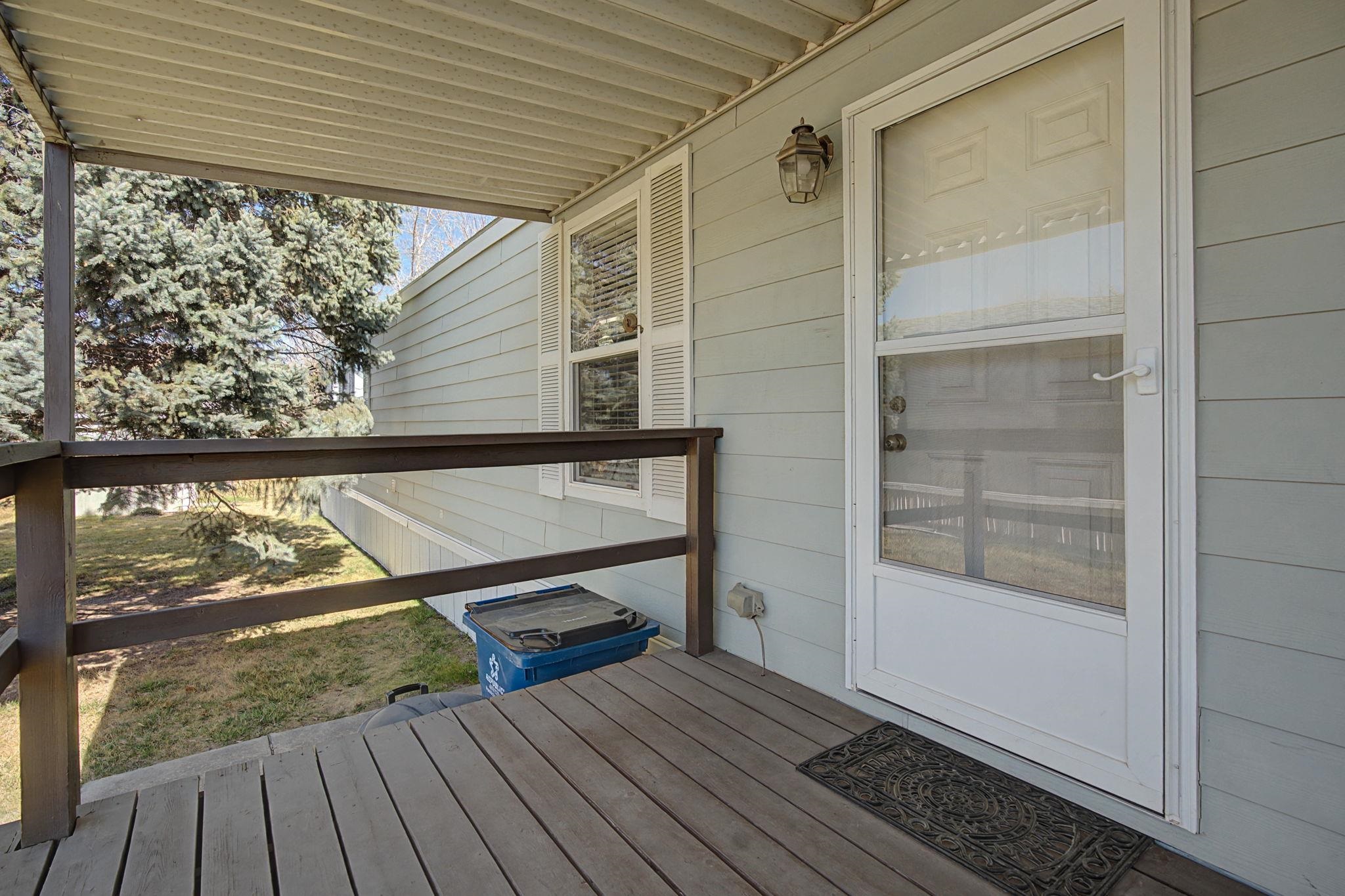 3251 E Road, Unit 72 Clifton, CO 81520 - Photo 3 of 25 a view of outdoor space with deck and wooden floor
