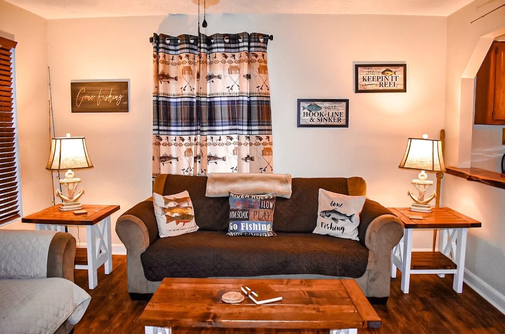 4551 Grove Hill River Road Shenandoah, VA 22849 - Photo 15 of 41 a living room with furniture a flat screen tv and kitchen view