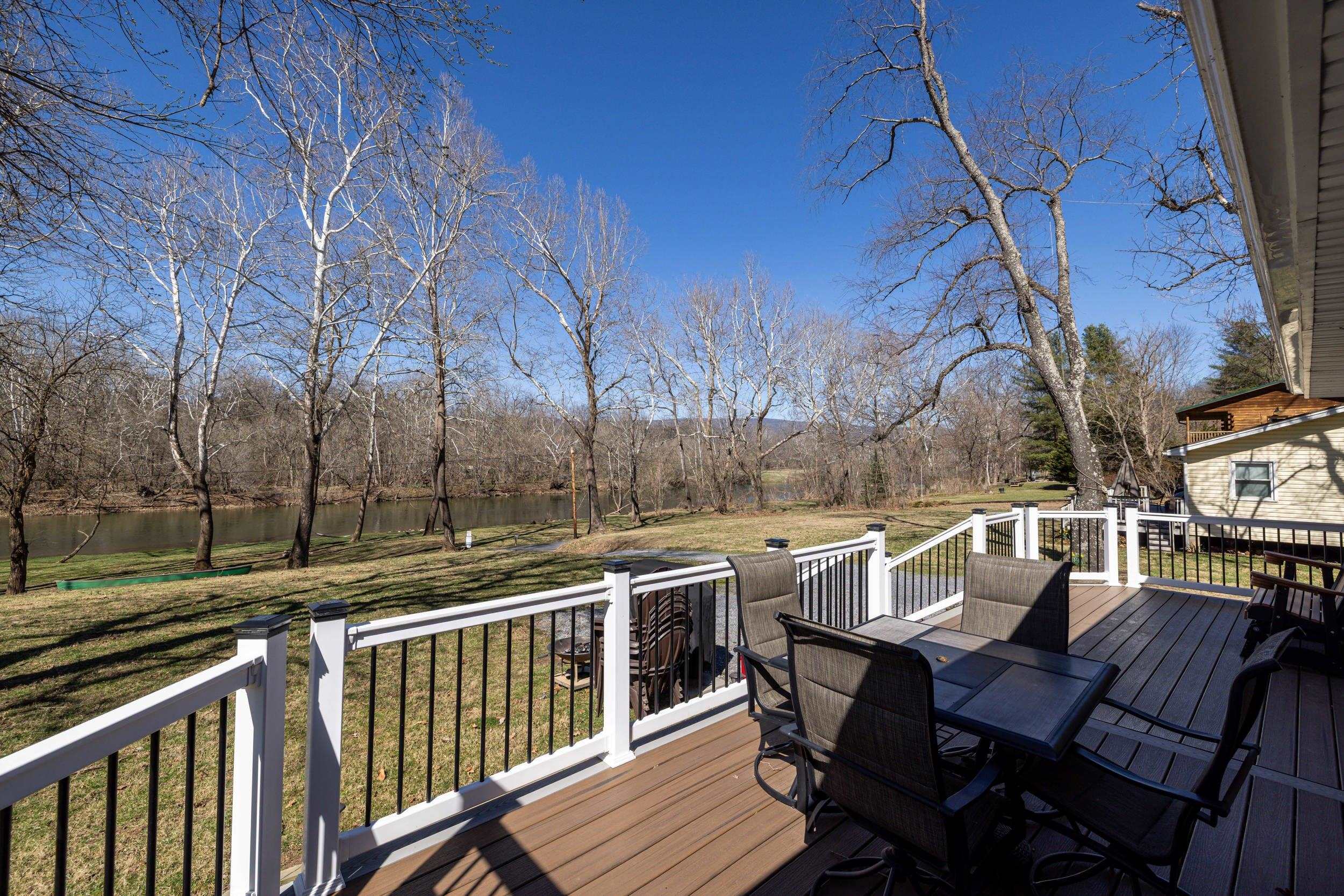 4551 Grove Hill River Road Shenandoah, VA 22849 - Photo 24 of 41 a view of a chairs and table on the deck