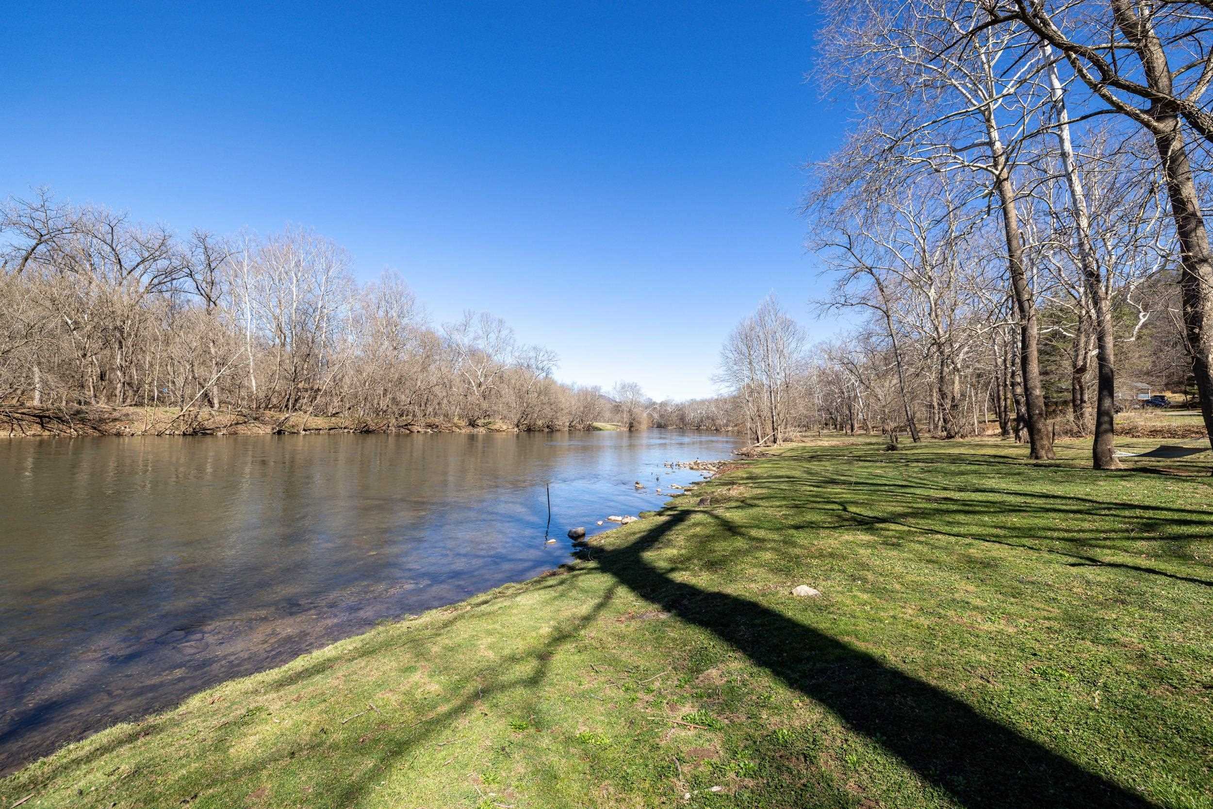4551 Grove Hill River Road Shenandoah, VA 22849 - Photo 30 of 41 a view of a lake from a yard