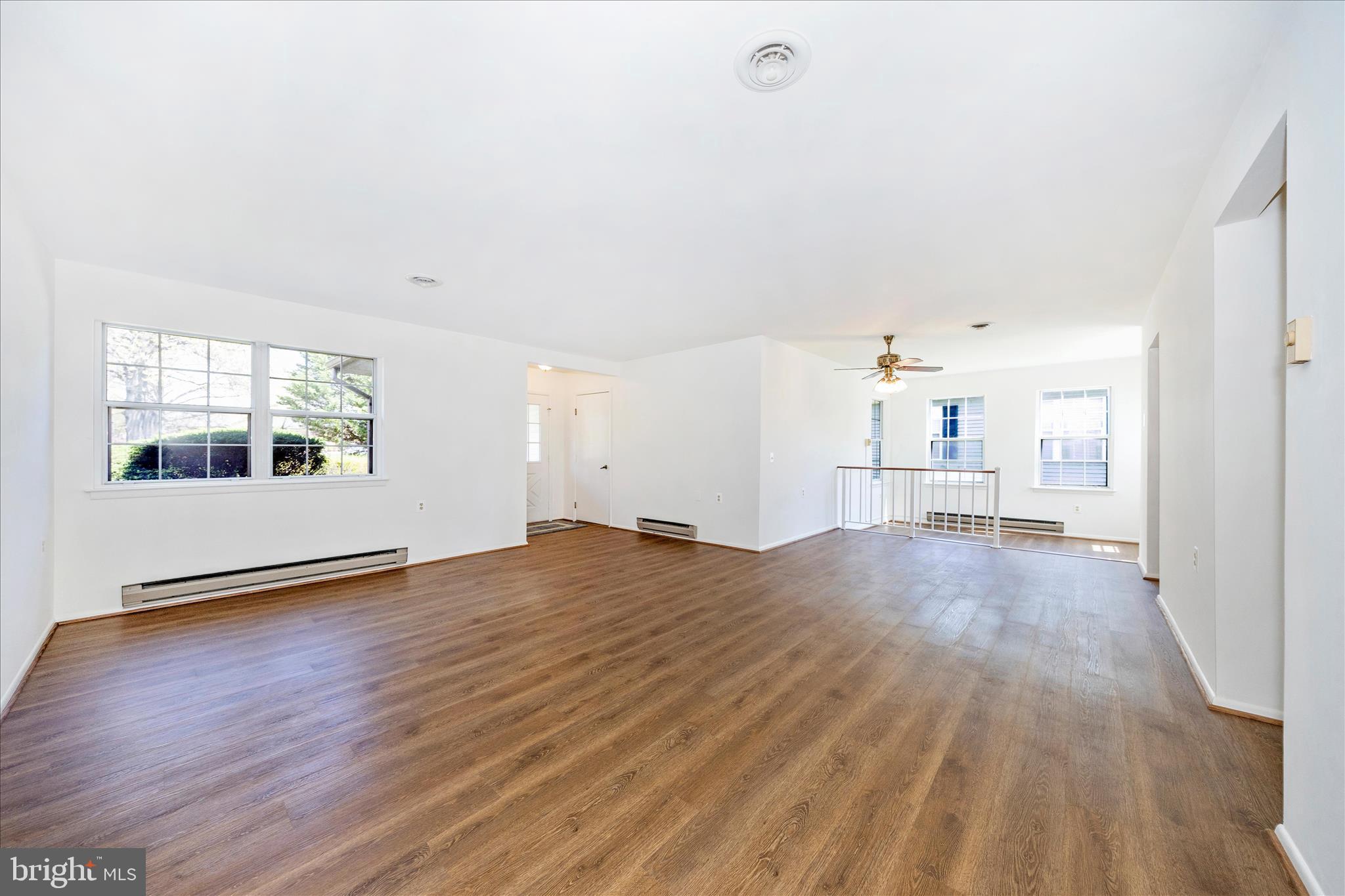 5738 Box Elder Court Frederick, MD 21703 - Photo 50 of 50 a view of empty room with wooden floor and fan