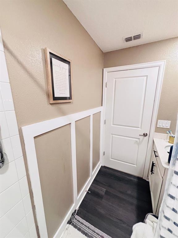 279 Bergamot Loop Davenport, FL 33837 - Photo 18 of 38 a view of a hallway with wooden floor and staircase