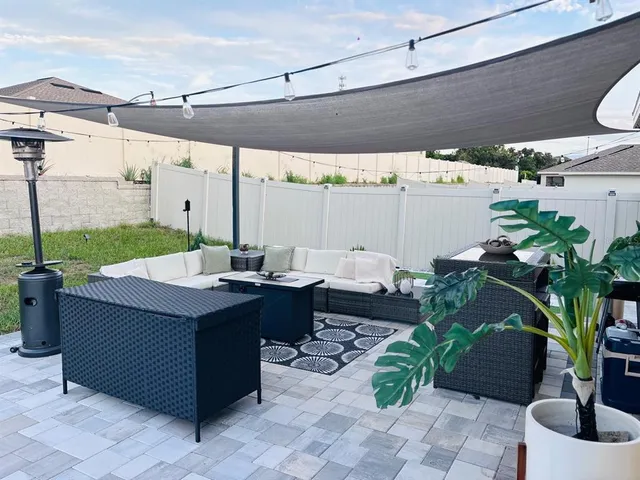 a front view of a house with garden view