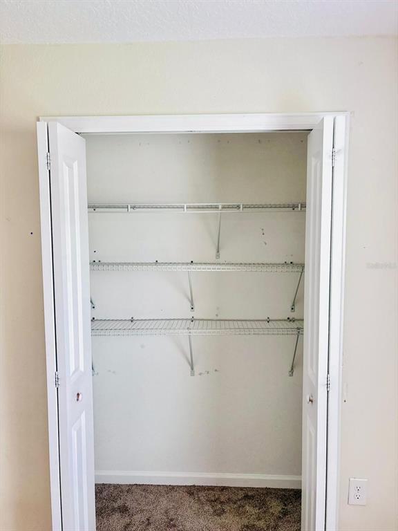 279 Bergamot Loop Davenport, FL 33837 - Photo 34 of 38 a close view of closet