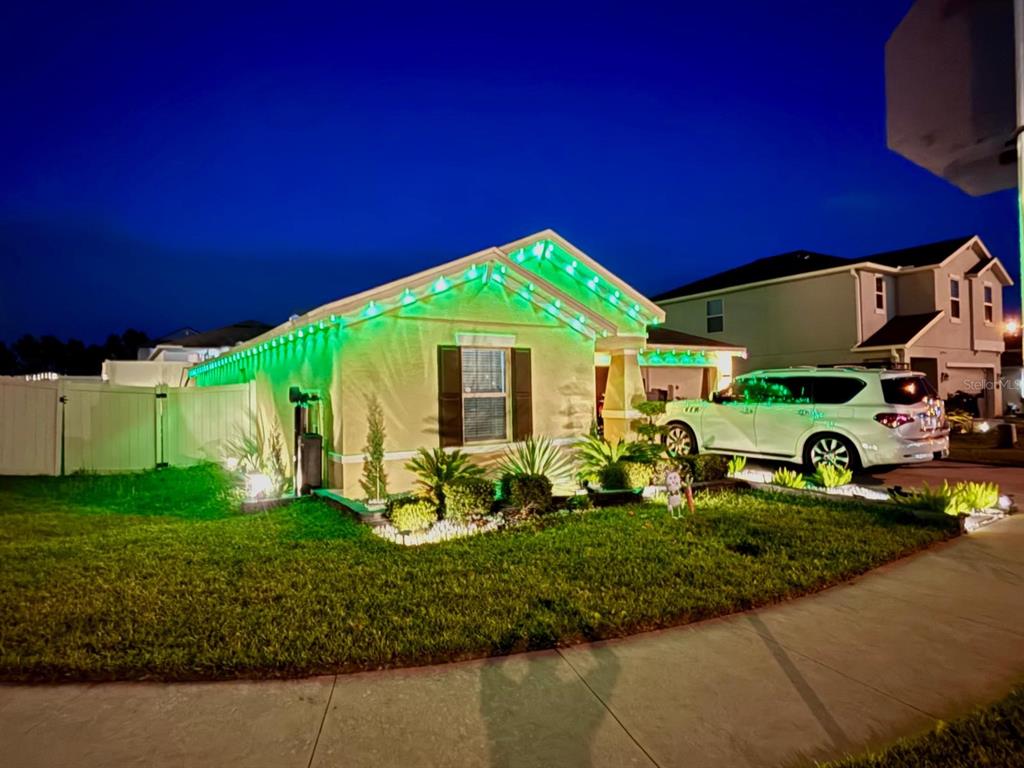 279 Bergamot Loop Davenport, FL 33837 - Photo 6 of 38 a view of a house with backyard
