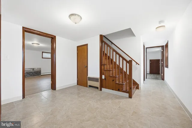 a view of a hallway with staircase