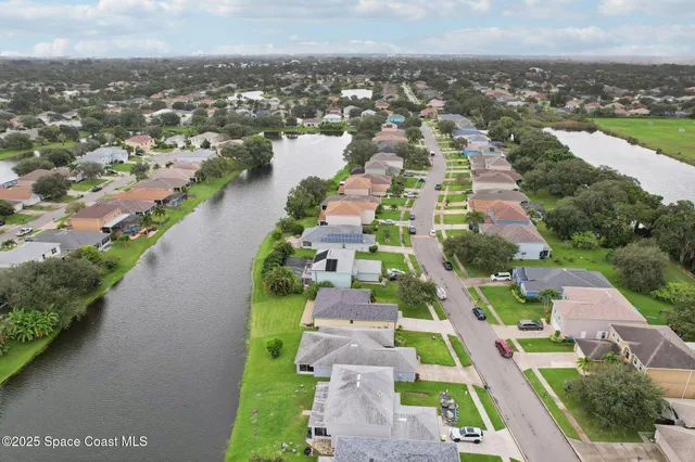 a view of swimming pool with a lounge chair