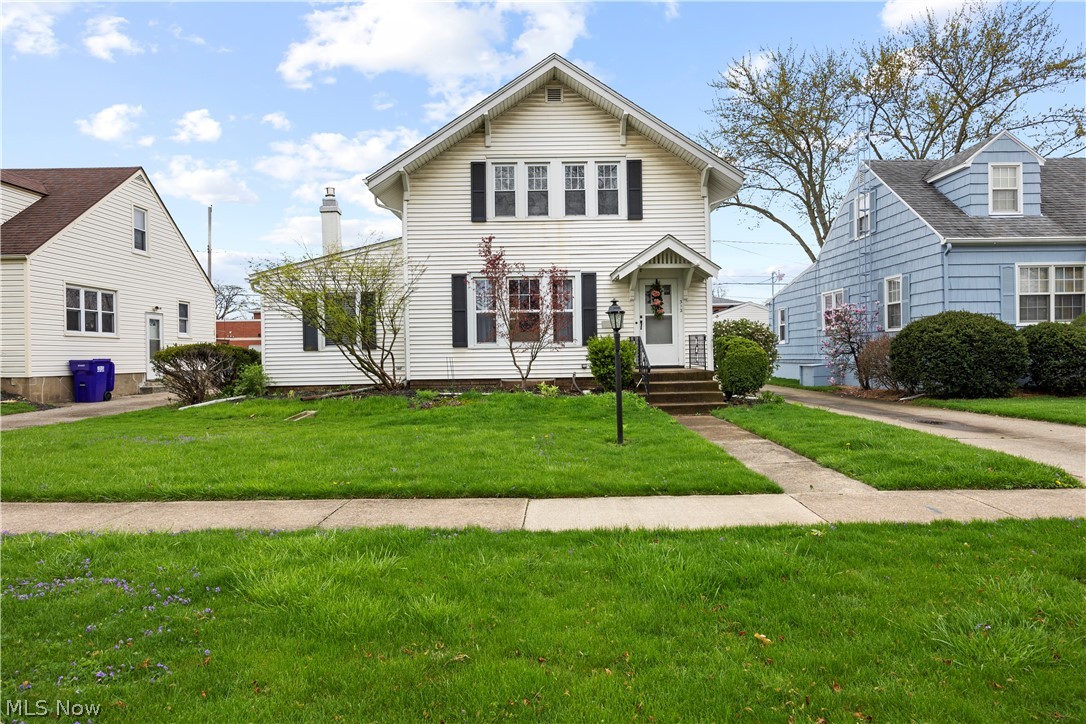 312 42nd Street Sandusky, OH 44870 - Photo 1 of 1 View of front of home with a front yard