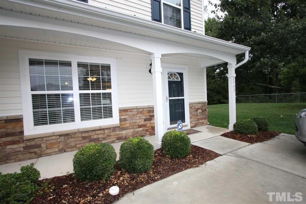 8902 Thornton Garden Lane Raleigh, NC 27616 - Photo 3 of 23 a front view of a house with garden