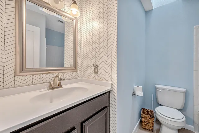 a bathroom with a sink and a toilet