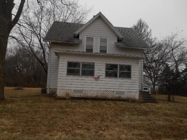 419 North Appleton Road Belvidere, IL 61008 - Photo 1 of 21 a front view of a house with a garden