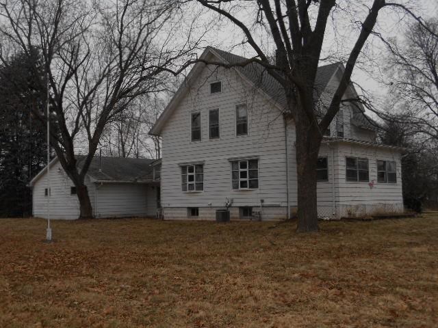 419 North Appleton Road Belvidere, IL 61008 - Photo 2 of 21 a house with trees in front of it
