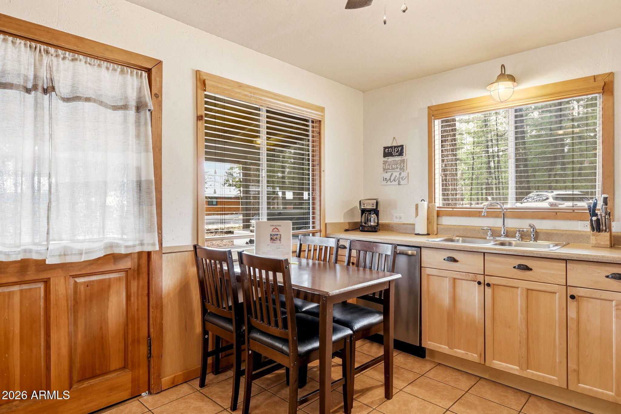 41 Main Street Greer, AZ 85927 - Photo 11 of 30 a view of a kitchen with granite countertop a sink and a counter top space