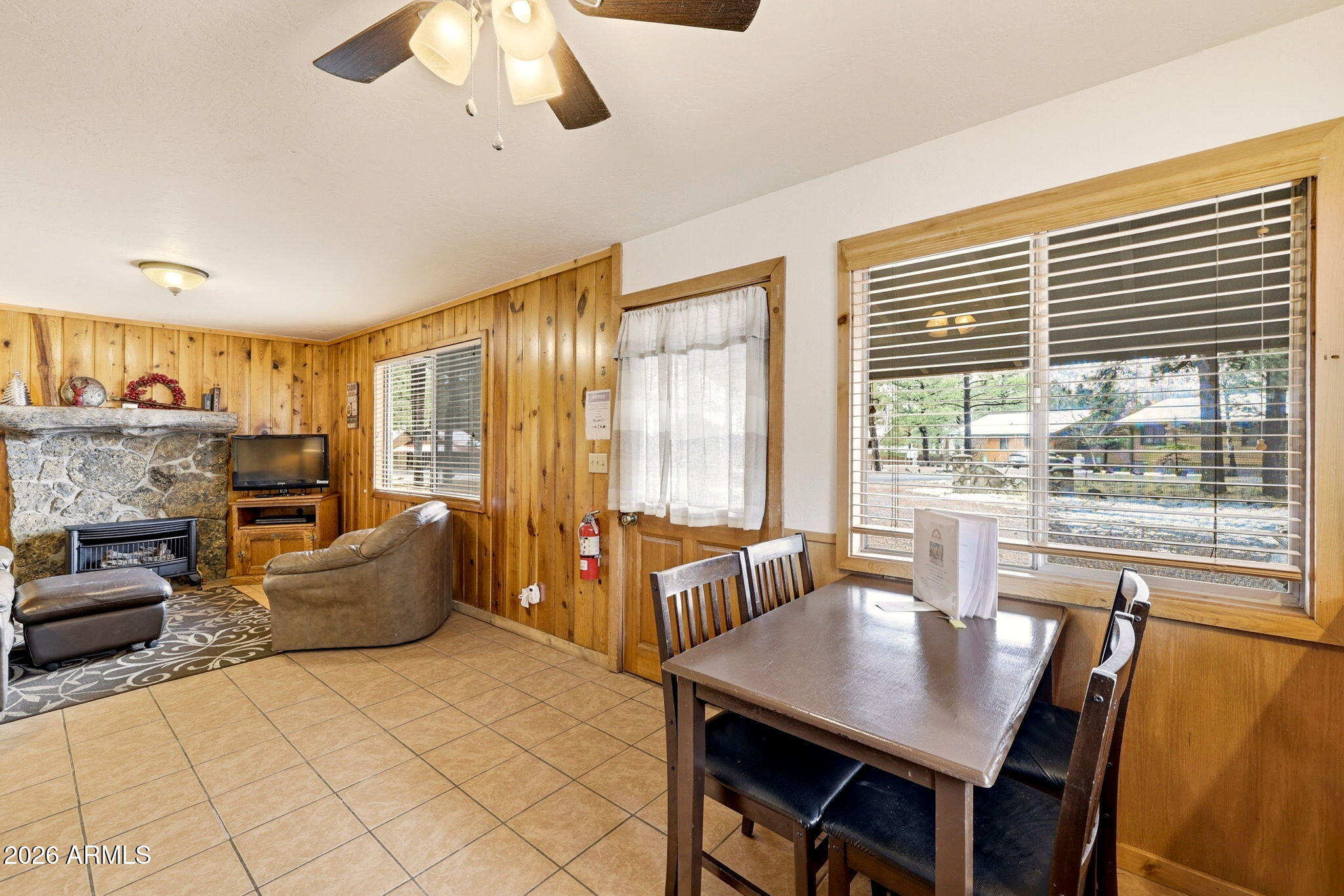 41 Main Street Greer, AZ 85927 - Photo 14 of 30 a view of a dining room with furniture window and outside view