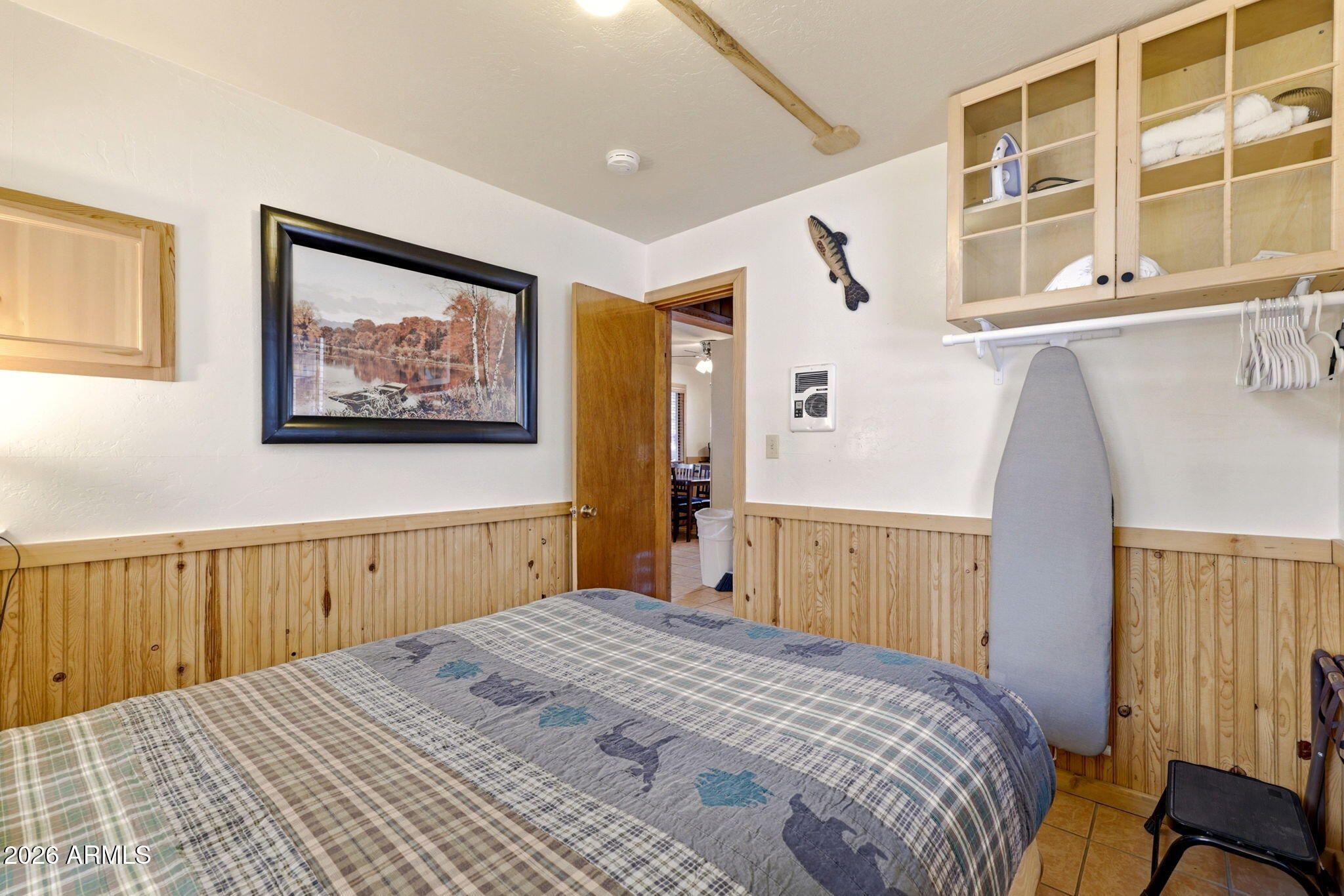 41 Main Street Greer, AZ 85927 - Photo 16 of 30 a bedroom with a bed and a window