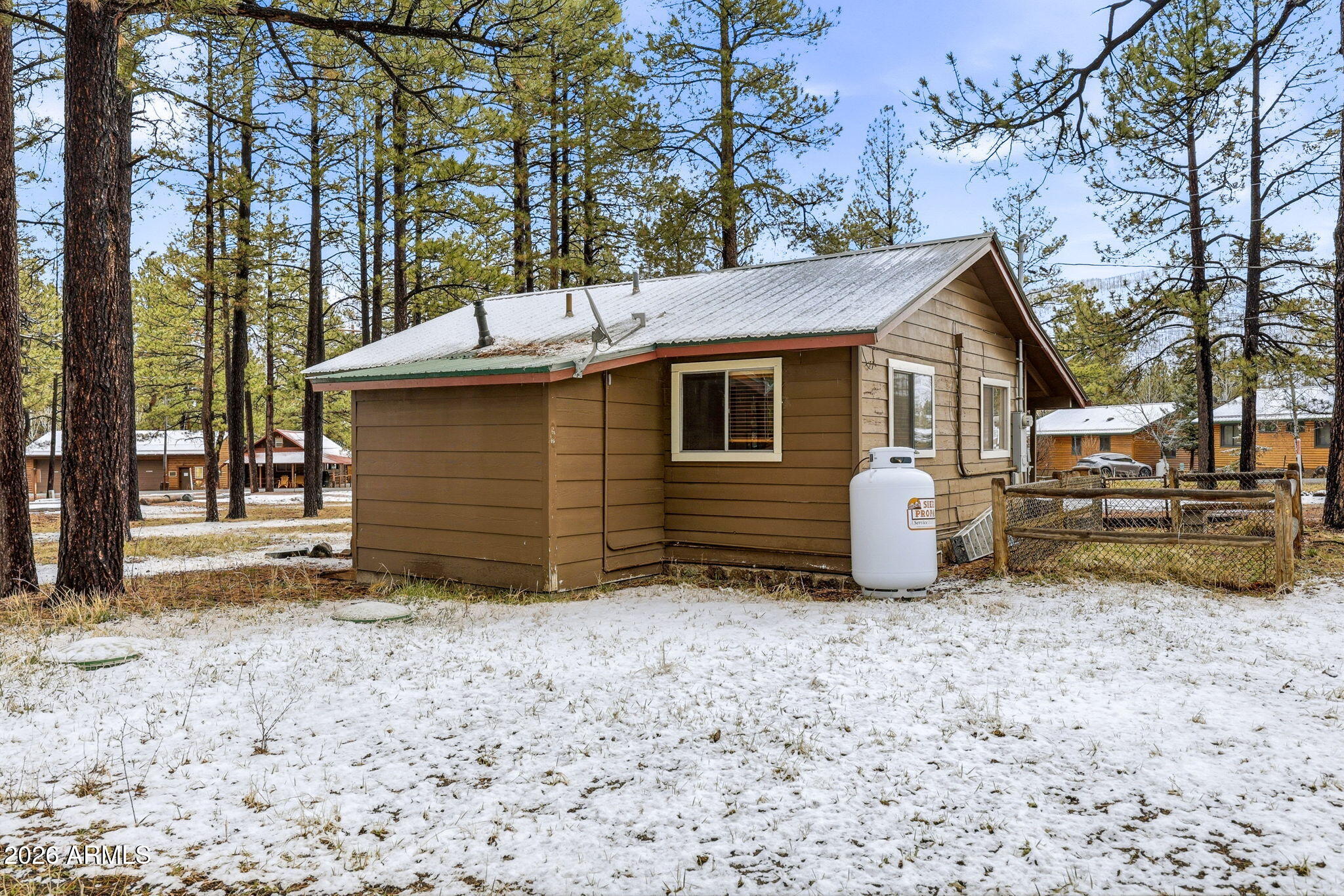 41 Main Street Greer, AZ 85927 - Photo 21 of 30 a view of a house with a yard