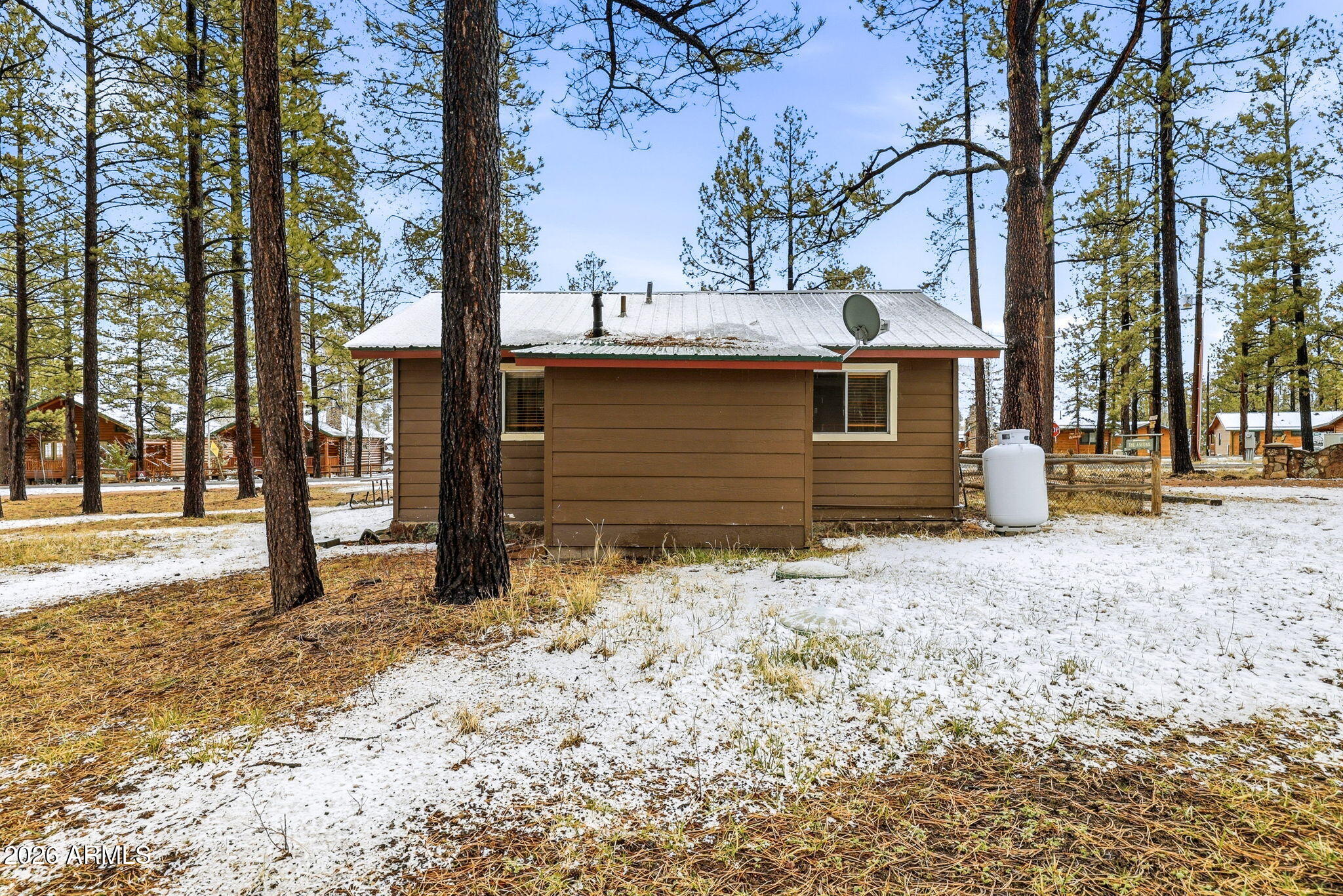 41 Main Street Greer, AZ 85927 - Photo 22 of 30 a front view of a house with a yard