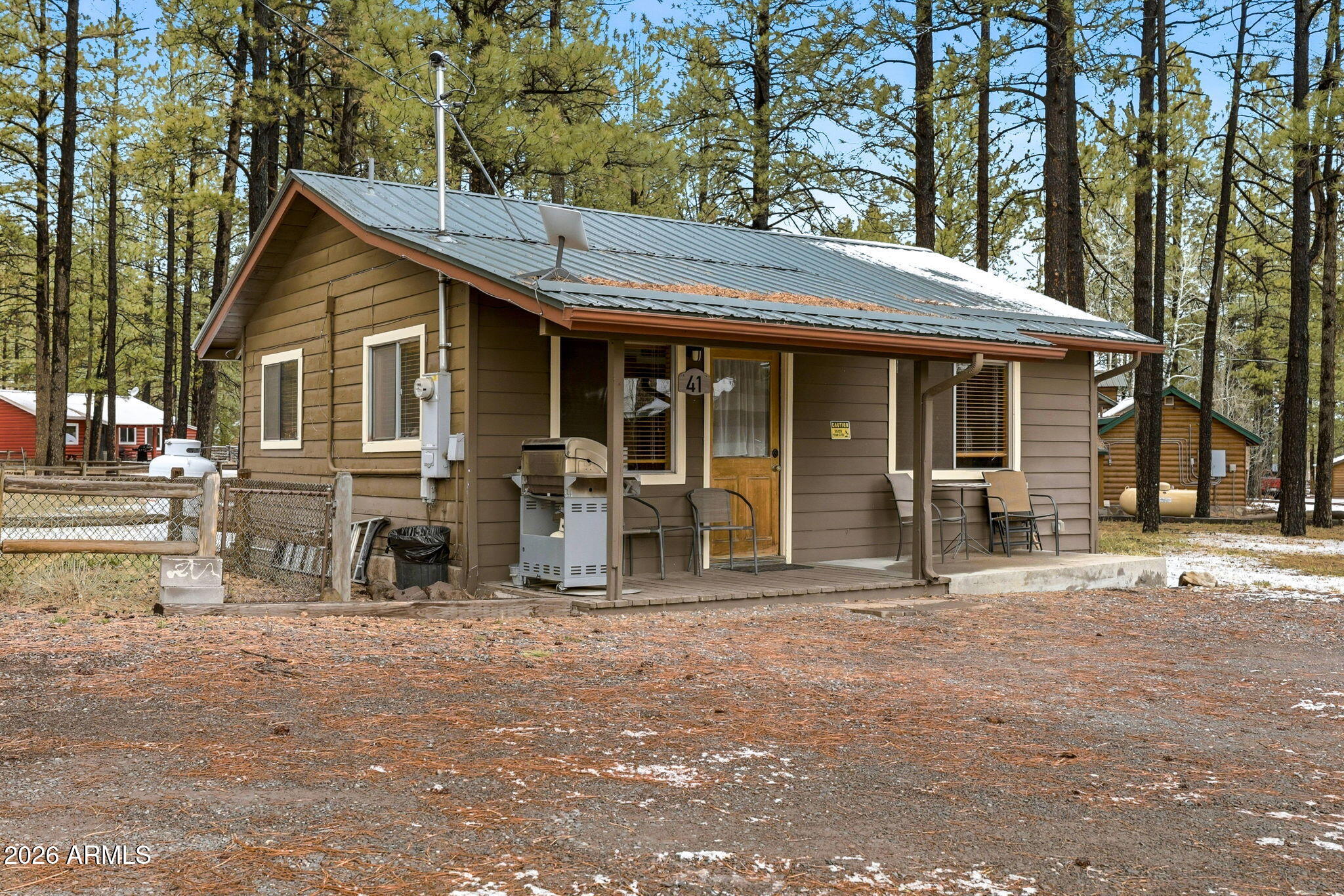 41 Main Street Greer, AZ 85927 - Photo 2 of 30 a view of a house with a outdoor space