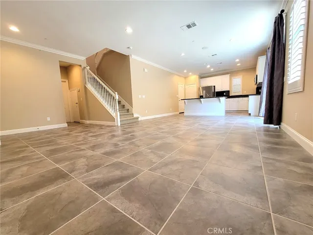 a view of a hall with a sink and a window