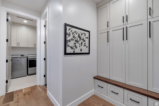 2145 North Main Street Centerville, UT 84014 - Photo 21 of 53 Mudroom featuring light wood-style floors, independent washer and dryer, and recessed lighting
