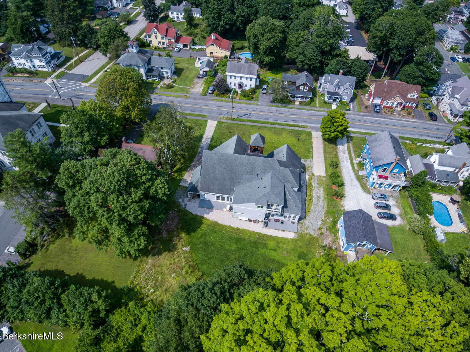 160 High Street Lee, MA 01238 - Photo 2 of 41 an aerial view of residential house with outdoor space and swimming pool