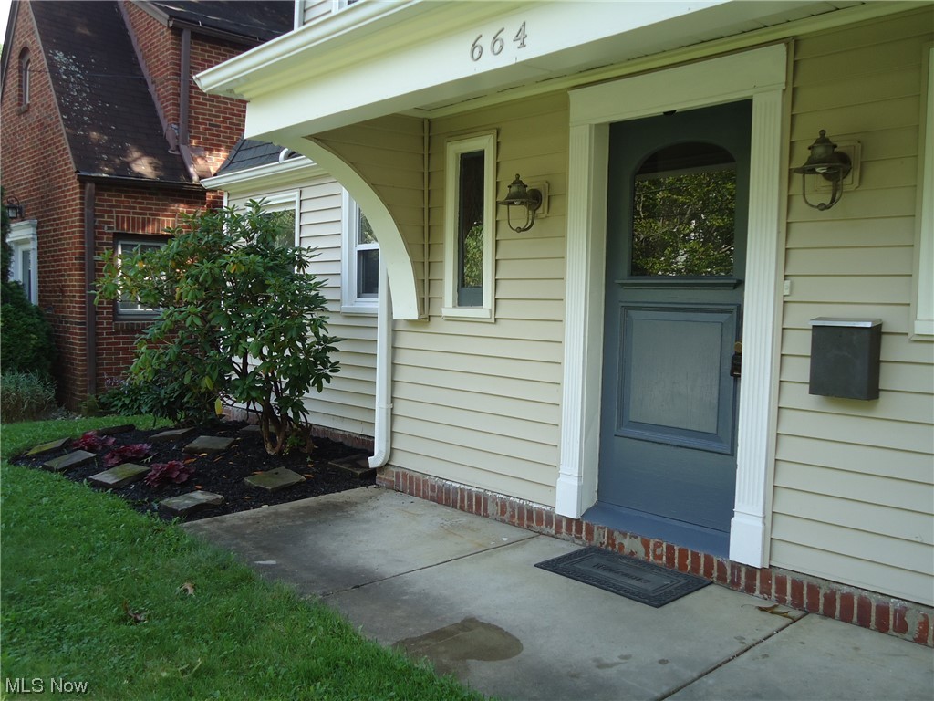 664 Ecton Road Akron, OH 44303 - Photo 3 of 35 View of exterior entry featuring a porch