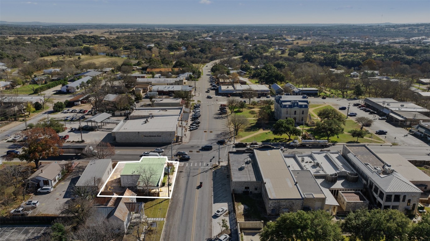 401 Main Street Blanco, TX 78606 - Photo 1 of 36 an aerial view of a city