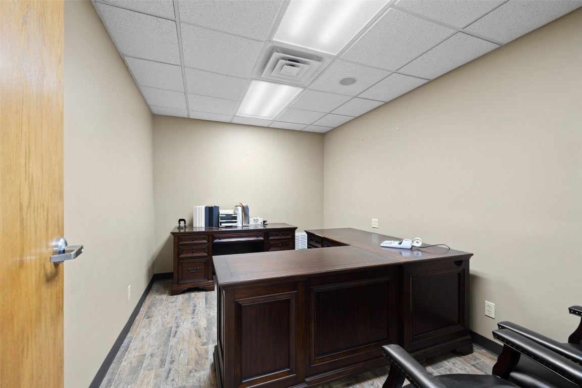 401 Main Street Blanco, TX 78606 - Photo 16 of 36 a view of a workspace with furniture