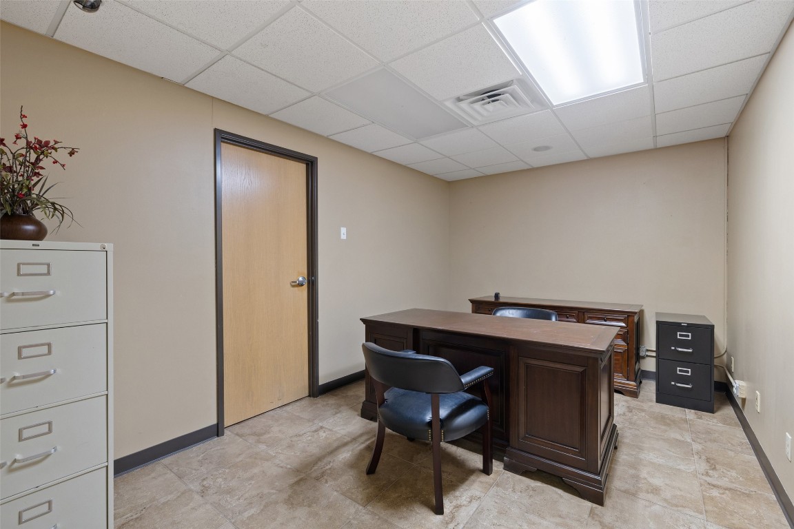 401 Main Street Blanco, TX 78606 - Photo 22 of 36 a workspace with furniture