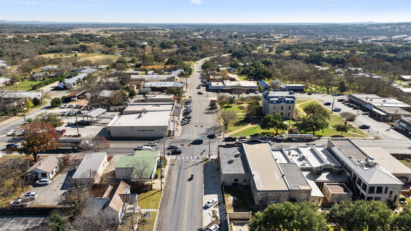 401 Main Street Blanco, TX 78606 - Photo 6 of 36 an aerial view of a city