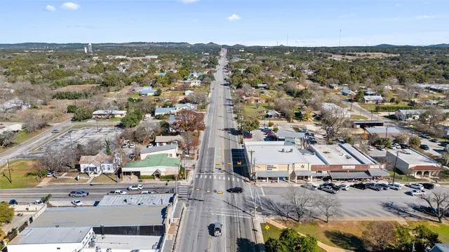 an aerial view of residential building with parking space