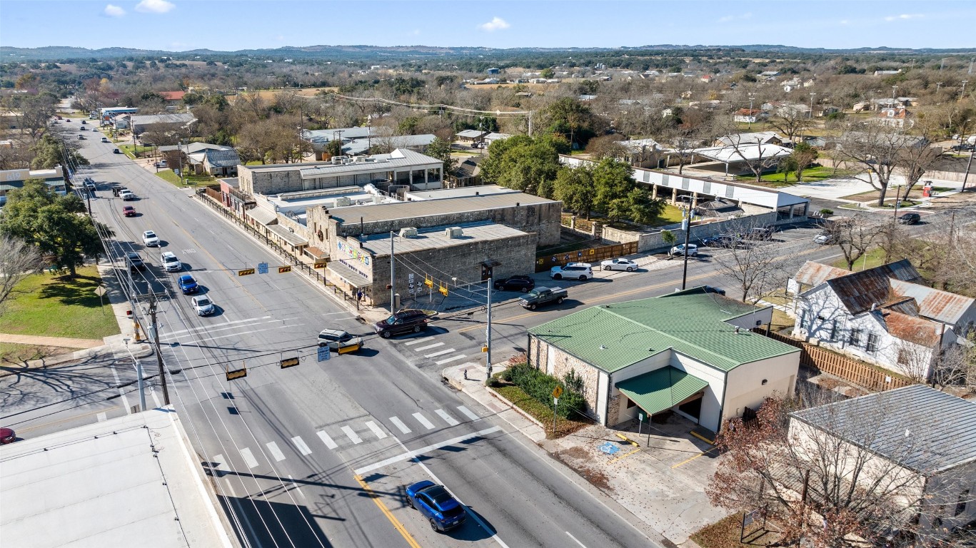 401 Main Street Blanco, TX 78606 - Photo 10 of 36 an aerial view of a city with lots of residential buildings