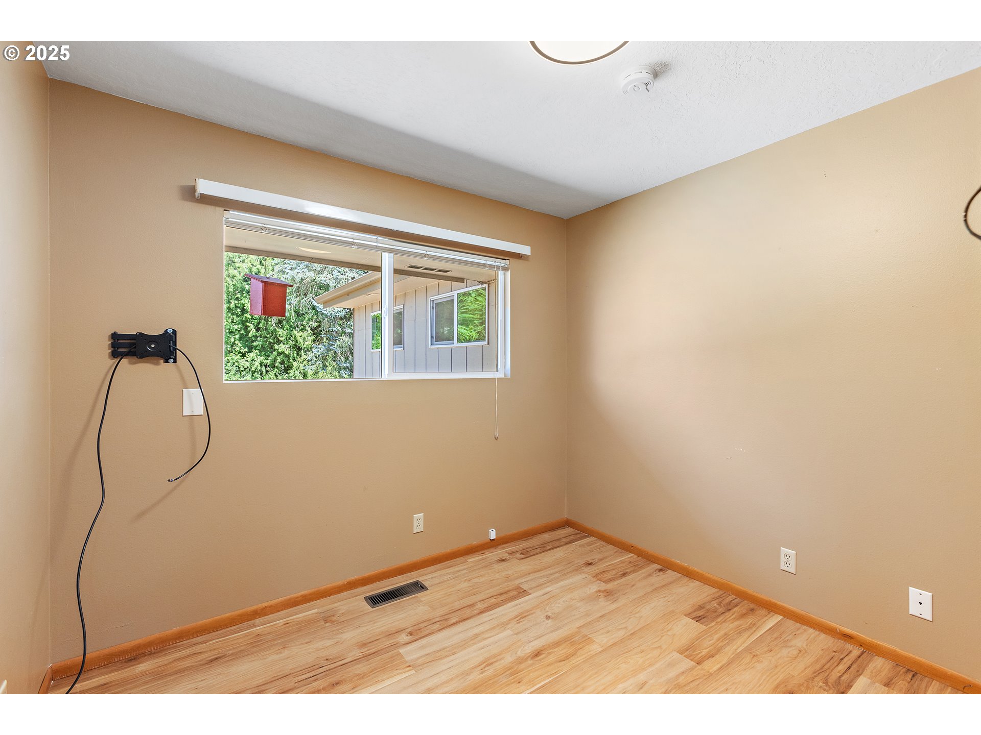 30700 South S Highway Canby, OR 97013 - Photo 13 of 37 a view of a room with wooden floor and windows