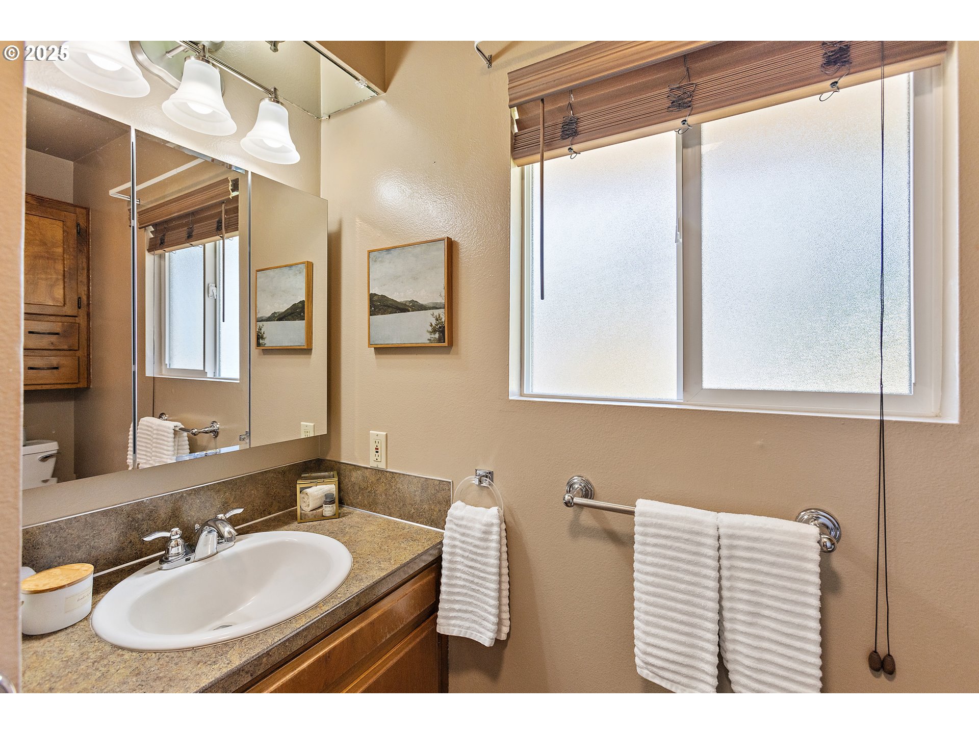 30700 South S Highway Canby, OR 97013 - Photo 15 of 37 a bathroom with a sink vanity granite and a mirror