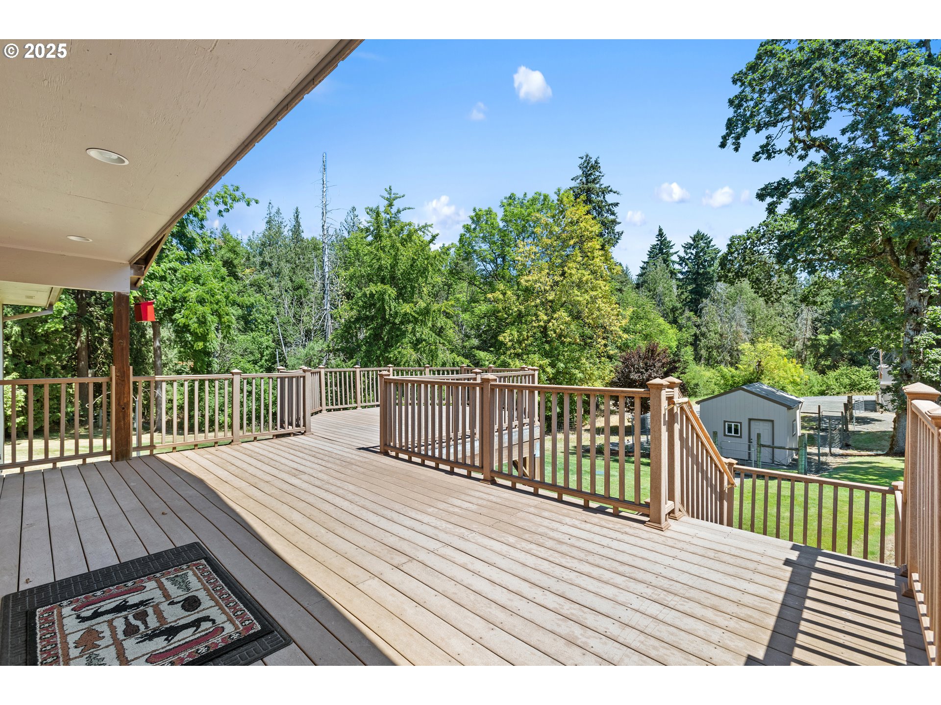 30700 South S Highway Canby, OR 97013 - Photo 26 of 37 a balcony with wooden floor and fence