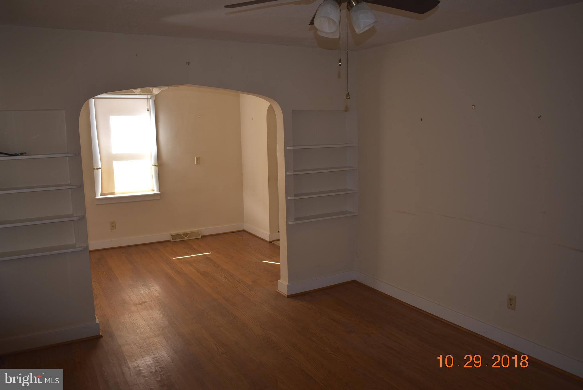 14210 Exline Road Hancock, MD 21750 - Photo 22 of 26 an empty room with wooden floor and windows