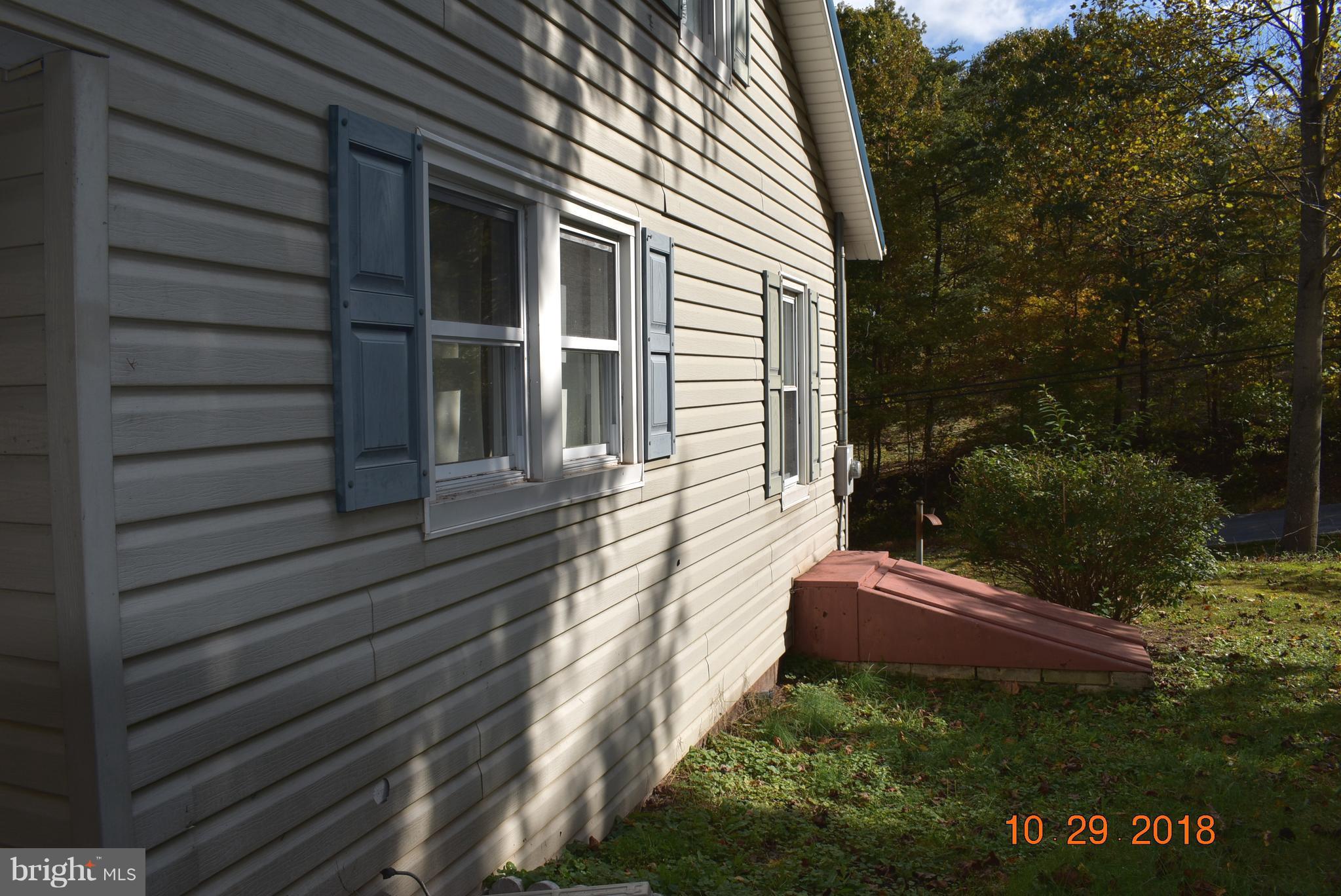 14210 Exline Road Hancock, MD 21750 - Photo 25 of 26 a view of a back yard of the house