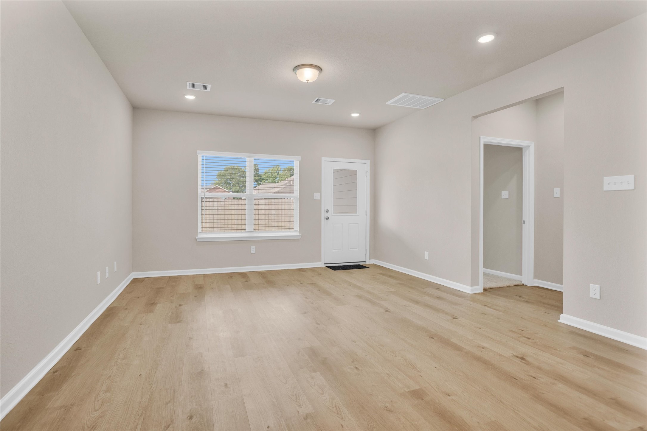 9749 Enclave Ridge Road Willis, TX 77318 - Photo 2 of 29 Main living area, open concept with kitchen and dining.